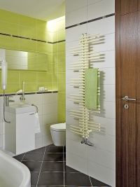 Koupelnový radiátor Zehnder Yucca svým vzhledem připomíná palmu juka, 1 340 x 500 mm, připojení na elektrický provoz, provedení jednořadové, barva pergamon, cena (bez DPH) 34 453 Kč. Koupelnový radiátor Zehnder Yucca svým vzhledem připomíná palmu juka, 1 340 x 500 mm, připojení na elektrický provoz, provedení jednořadové, barva pergamon, cena (bez DPH) 34 453 Kč.